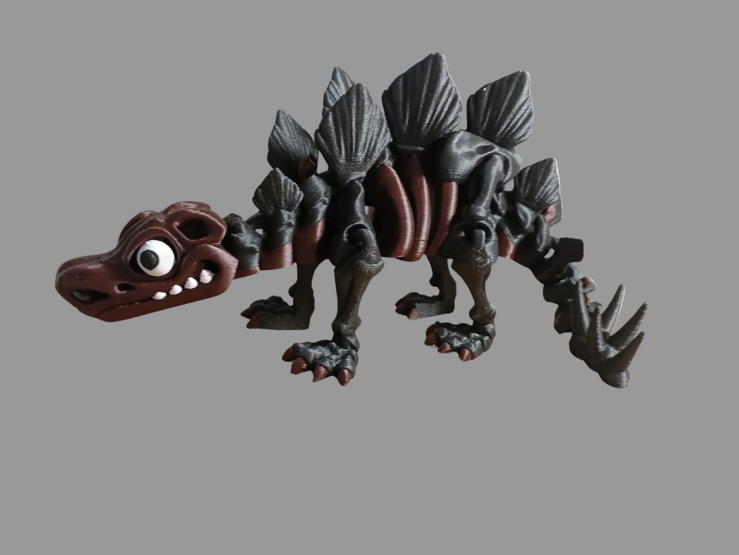 3D-printed articulated Skeleton Stegosaurus flexi & posable model.